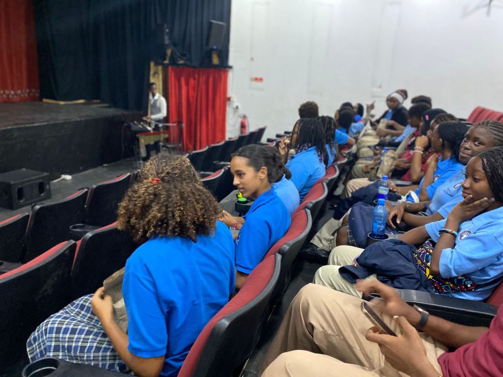 MIS Students wait for the play to start
